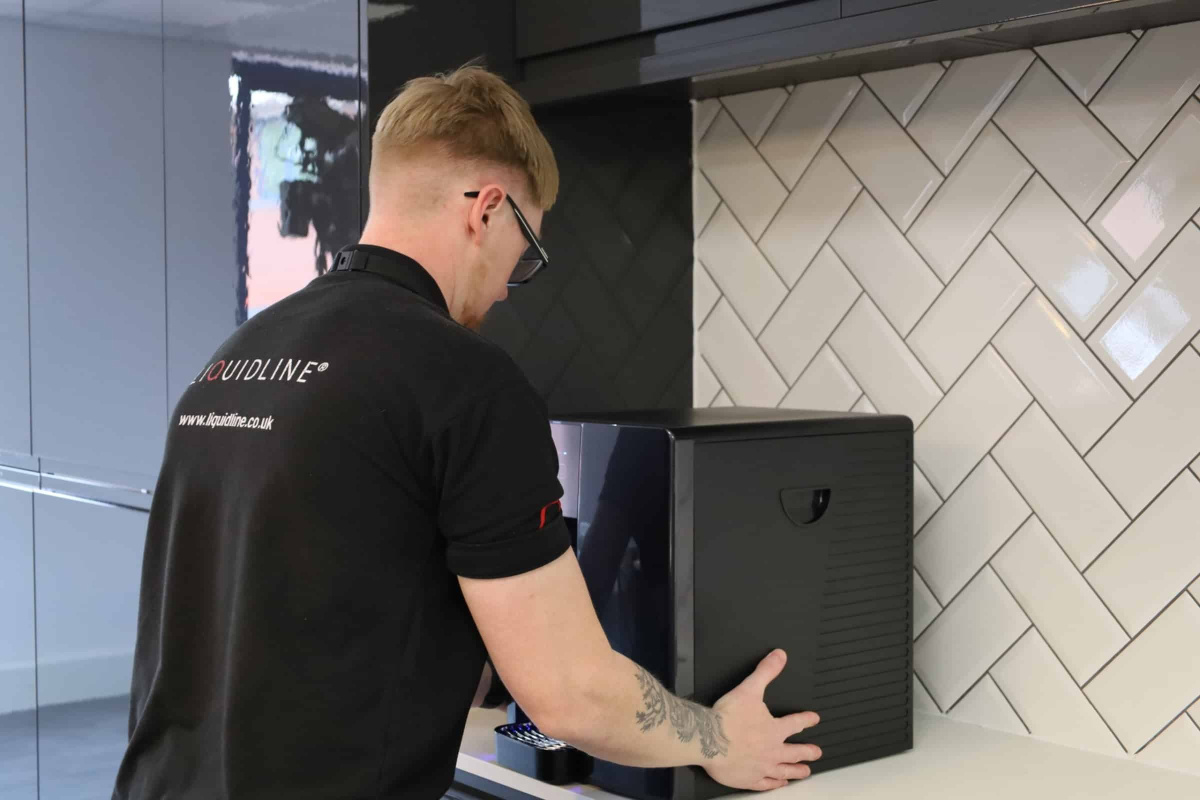 Liquidline engineer installing a ice machine