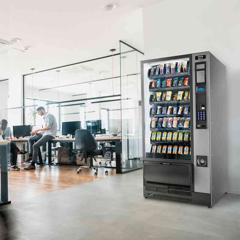 Swing Vending Machine in Office setting with staff working in the background