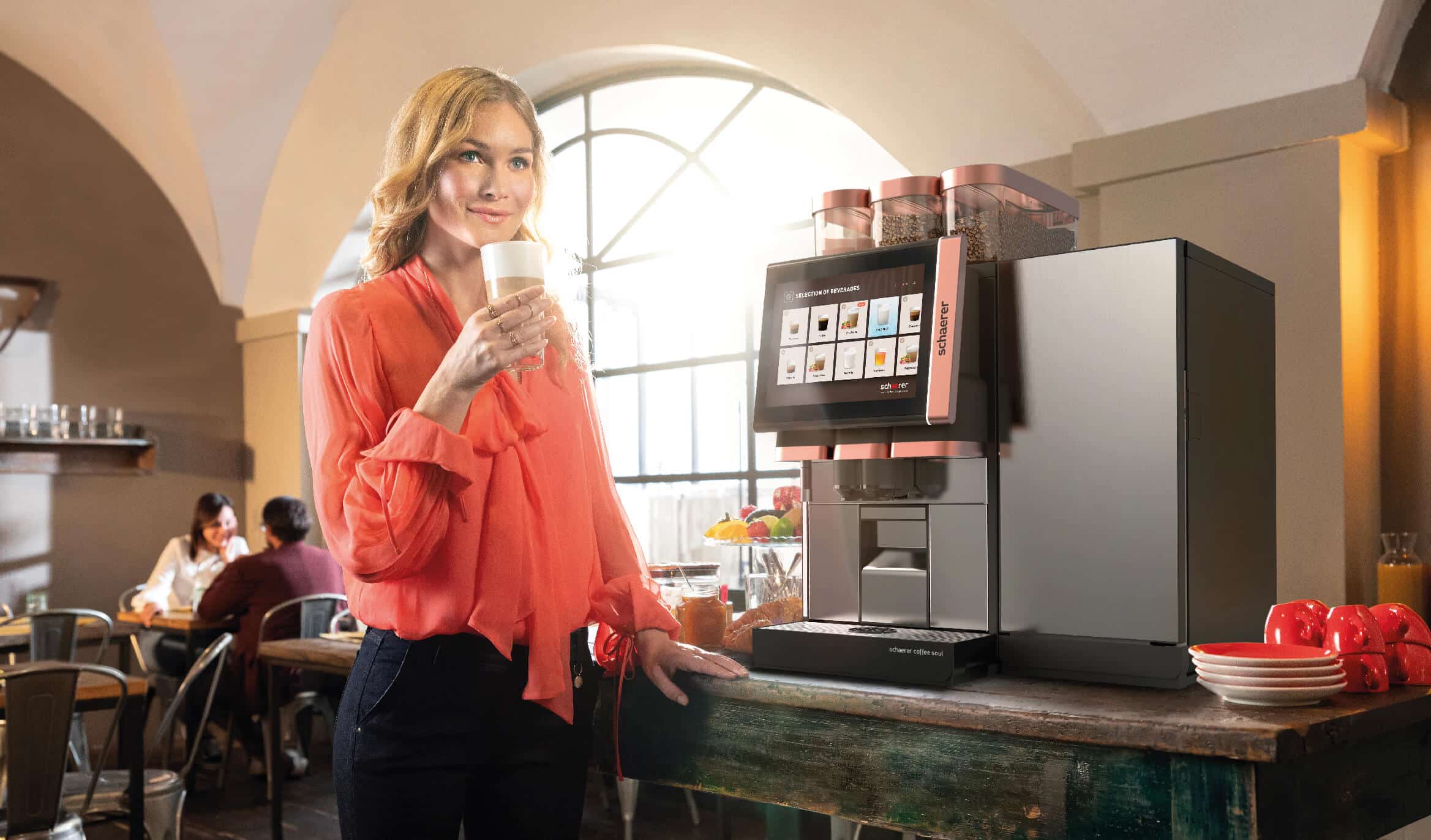 Woman Drinking Coffee At Machine