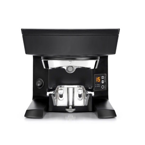 Front view of a black PUQPress M2 automatic coffee tamper with a digital display on the right side and a central metal tamping head above the portafilter holder.