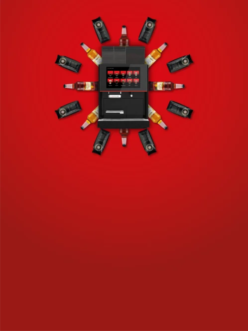 image of syrups and chocolate powder around a coffee machine